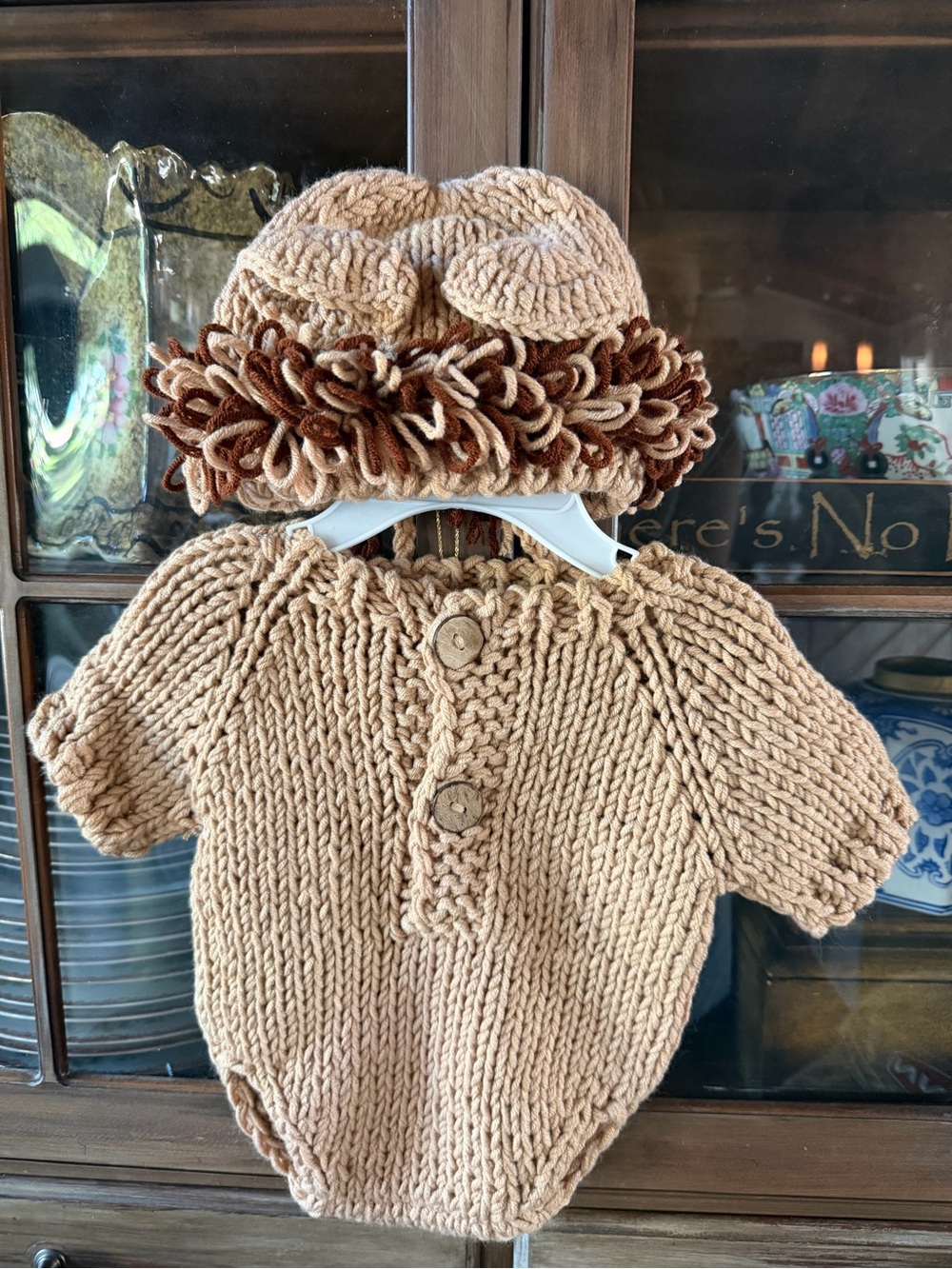 Hand-Knit Cream Baby Hat and Romper Set with Brown Trim